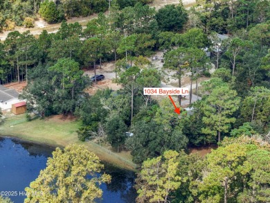 Welcome to your lakeside retreat in the heart of Boiling Spring on The Lakes Country Club in North Carolina - for sale on GolfHomes.com, golf home, golf lot