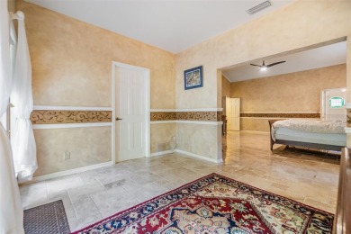 Tucked inside the gates of Cypress Run, this one-of-a-kind on Cypress Run Golf Club  in Florida - for sale on GolfHomes.com, golf home, golf lot