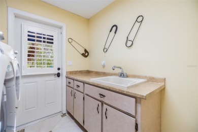Tucked inside the gates of Cypress Run, this one-of-a-kind on Cypress Run Golf Club  in Florida - for sale on GolfHomes.com, golf home, golf lot