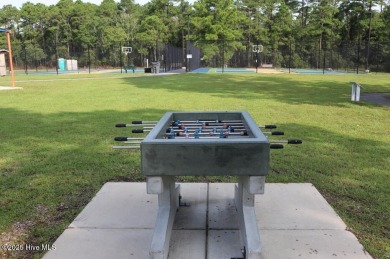 Motivated Seller! Bring us an offer! Welcome to your lakeside on The Lakes Country Club in North Carolina - for sale on GolfHomes.com, golf home, golf lot