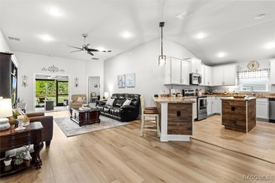 Scenically situated along the 10th hole tee of the highly on Twisted Oaks Golf Club in Florida - for sale on GolfHomes.com, golf home, golf lot