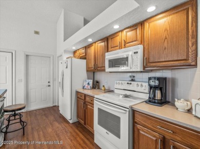 Beautifully updated 1990 Palmwood Bermuda  pool home. This on Glen Lakes Country Club in Florida - for sale on GolfHomes.com, golf home, golf lot