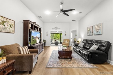 Scenically situated along the 10th hole tee of the highly on Twisted Oaks Golf Club in Florida - for sale on GolfHomes.com, golf home, golf lot
