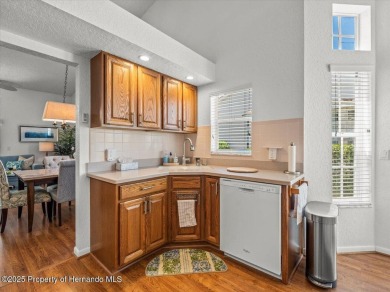 Beautifully updated 1990 Palmwood Bermuda  pool home. This on Glen Lakes Country Club in Florida - for sale on GolfHomes.com, golf home, golf lot