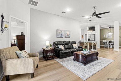 Scenically situated along the 10th hole tee of the highly on Twisted Oaks Golf Club in Florida - for sale on GolfHomes.com, golf home, golf lot