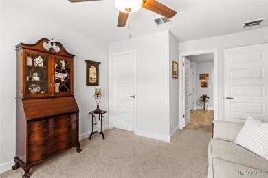 Scenically situated along the 10th hole tee of the highly on Twisted Oaks Golf Club in Florida - for sale on GolfHomes.com, golf home, golf lot