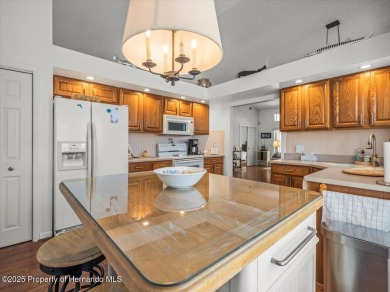 Beautifully updated 1990 Palmwood Bermuda  pool home. This on Glen Lakes Country Club in Florida - for sale on GolfHomes.com, golf home, golf lot