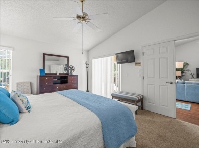 Beautifully updated 1990 Palmwood Bermuda  pool home. This on Glen Lakes Country Club in Florida - for sale on GolfHomes.com, golf home, golf lot