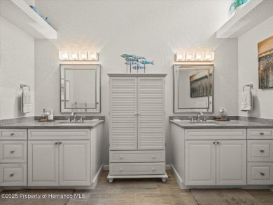 Beautifully updated 1990 Palmwood Bermuda  pool home. This on Glen Lakes Country Club in Florida - for sale on GolfHomes.com, golf home, golf lot