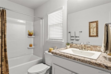 Scenically situated along the 10th hole tee of the highly on Twisted Oaks Golf Club in Florida - for sale on GolfHomes.com, golf home, golf lot