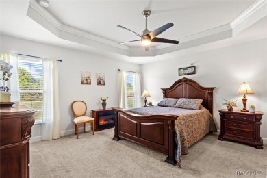 Scenically situated along the 10th hole tee of the highly on Twisted Oaks Golf Club in Florida - for sale on GolfHomes.com, golf home, golf lot