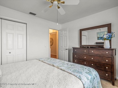 Beautifully updated 1990 Palmwood Bermuda  pool home. This on Glen Lakes Country Club in Florida - for sale on GolfHomes.com, golf home, golf lot