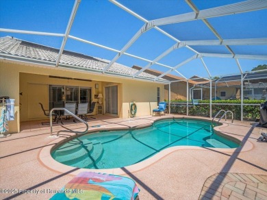Beautifully updated 1990 Palmwood Bermuda  pool home. This on Glen Lakes Country Club in Florida - for sale on GolfHomes.com, golf home, golf lot