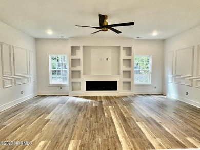 Discover a home that flawlessly blends modern sophistication on Carolina Shores Golf Course in North Carolina - for sale on GolfHomes.com, golf home, golf lot