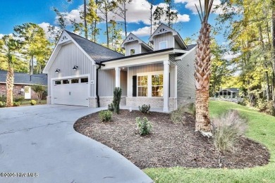 Discover a home that flawlessly blends modern sophistication on Carolina Shores Golf Course in North Carolina - for sale on GolfHomes.com, golf home, golf lot