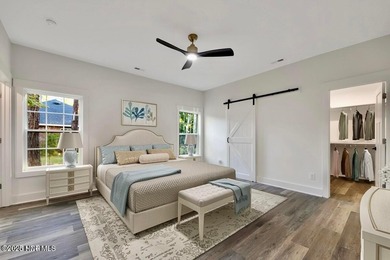 Discover a home that flawlessly blends modern sophistication on Carolina Shores Golf Course in North Carolina - for sale on GolfHomes.com, golf home, golf lot