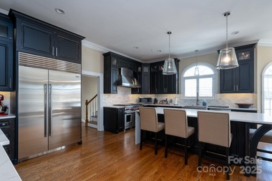 Truly a dream lakefront home on Badin Lake! With panoramic lake on Old North State Club at Uwharrie Point Golf community in North Carolina - for sale on GolfHomes.com, golf home, golf lot