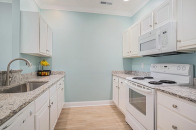 Welcome home! This lovely 3 bedroom, 2 1/2 bath condo is a on Palmetto Greens Golf and Country Club in South Carolina - for sale on GolfHomes.com, golf home, golf lot