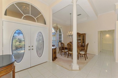 Don't miss out on this custom-built home with stunning pond and on Pinemoor West Golf Club in Florida - for sale on GolfHomes.com, golf home, golf lot