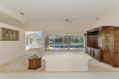 Don't miss out on this custom-built home with stunning pond and on Pinemoor West Golf Club in Florida - for sale on GolfHomes.com, golf home, golf lot