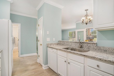 Welcome home! This lovely 3 bedroom, 2 1/2 bath condo is a on Palmetto Greens Golf and Country Club in South Carolina - for sale on GolfHomes.com, golf home, golf lot