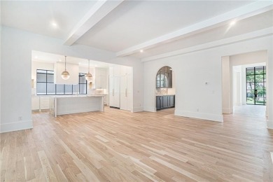 Set on a sprawling 1-acre lot in an established, tree-lined on Dunwoody Country Club in Georgia - for sale on GolfHomes.com, golf home, golf lot