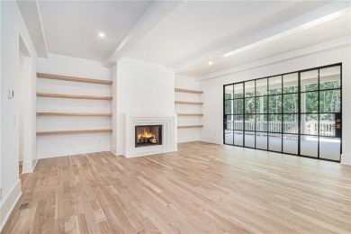 Set on a sprawling 1-acre lot in an established, tree-lined on Dunwoody Country Club in Georgia - for sale on GolfHomes.com, golf home, golf lot