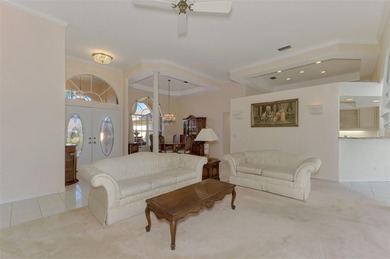 Don't miss out on this custom-built home with stunning pond and on Pinemoor West Golf Club in Florida - for sale on GolfHomes.com, golf home, golf lot