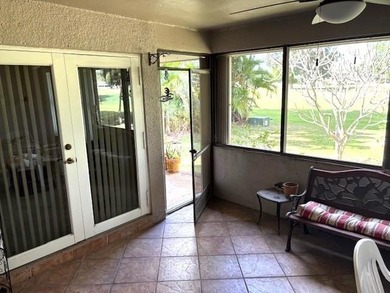 On Golf Course Views of CC of Miami!! One story corner unit with on Country Club of Miami in Florida - for sale on GolfHomes.com, golf home, golf lot