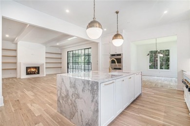 Set on a sprawling 1-acre lot in an established, tree-lined on Dunwoody Country Club in Georgia - for sale on GolfHomes.com, golf home, golf lot