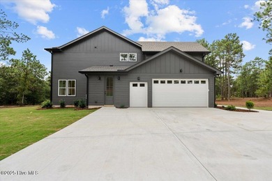 This dreamy new house, built by Druther Homes, has everything on Beacon Ridge Golf and Country Club in North Carolina - for sale on GolfHomes.com, golf home, golf lot