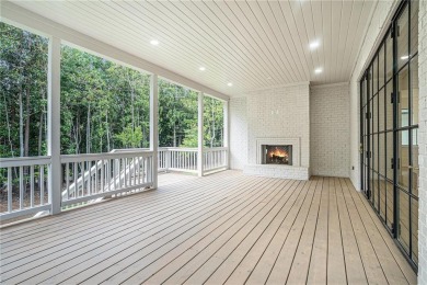 Set on a sprawling 1-acre lot in an established, tree-lined on Dunwoody Country Club in Georgia - for sale on GolfHomes.com, golf home, golf lot