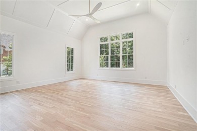 Set on a sprawling 1-acre lot in an established, tree-lined on Dunwoody Country Club in Georgia - for sale on GolfHomes.com, golf home, golf lot