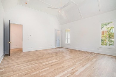 Set on a sprawling 1-acre lot in an established, tree-lined on Dunwoody Country Club in Georgia - for sale on GolfHomes.com, golf home, golf lot