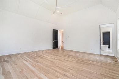 Set on a sprawling 1-acre lot in an established, tree-lined on Dunwoody Country Club in Georgia - for sale on GolfHomes.com, golf home, golf lot