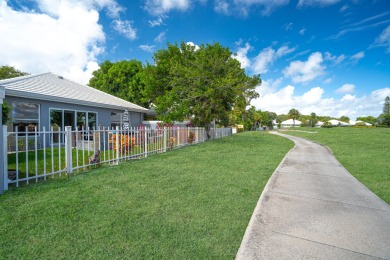 Stunning Views! Enjoy South Florida living in the sought-after on Bear Lakes Country Club in Florida - for sale on GolfHomes.com, golf home, golf lot