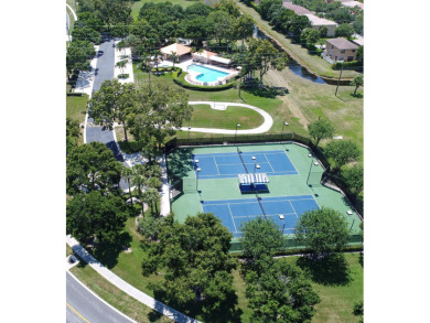 Stunning Views! Enjoy South Florida living in the sought-after on Bear Lakes Country Club in Florida - for sale on GolfHomes.com, golf home, golf lot