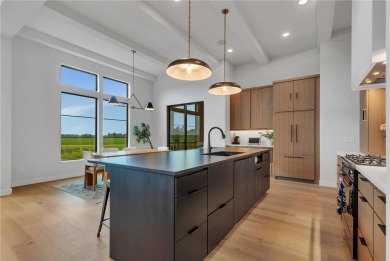 This incredible Werschay Homes masterpiece offers breathtaking on Blackberry Ridge Golf Club in Minnesota - for sale on GolfHomes.com, golf home, golf lot