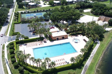 Stunning Views! Enjoy South Florida living in the sought-after on Bear Lakes Country Club in Florida - for sale on GolfHomes.com, golf home, golf lot