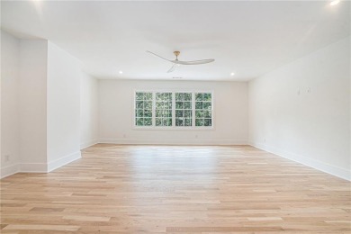 Set on a sprawling 1-acre lot in an established, tree-lined on Dunwoody Country Club in Georgia - for sale on GolfHomes.com, golf home, golf lot