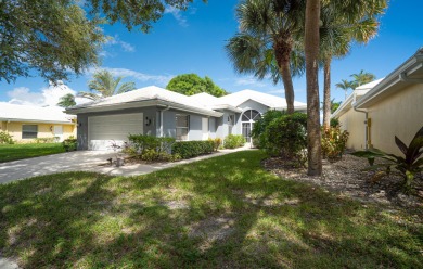 Stunning Views! Enjoy South Florida living in the sought-after on Bear Lakes Country Club in Florida - for sale on GolfHomes.com, golf home, golf lot