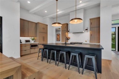 This incredible Werschay Homes masterpiece offers breathtaking on Blackberry Ridge Golf Club in Minnesota - for sale on GolfHomes.com, golf home, golf lot