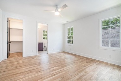 Set on a sprawling 1-acre lot in an established, tree-lined on Dunwoody Country Club in Georgia - for sale on GolfHomes.com, golf home, golf lot
