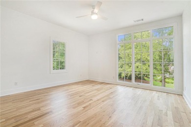 Set on a sprawling 1-acre lot in an established, tree-lined on Dunwoody Country Club in Georgia - for sale on GolfHomes.com, golf home, golf lot