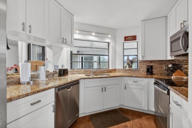 Rarely available 1st floor corner unit with serene lake views on Aberdeen Golf and Country Club in Florida - for sale on GolfHomes.com, golf home, golf lot