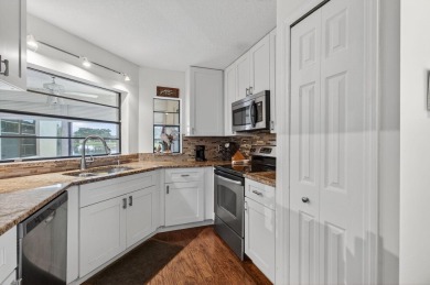 Rarely available 1st floor corner unit with serene lake views on Aberdeen Golf and Country Club in Florida - for sale on GolfHomes.com, golf home, golf lot