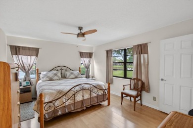 Rarely available 1st floor corner unit with serene lake views on Aberdeen Golf and Country Club in Florida - for sale on GolfHomes.com, golf home, golf lot