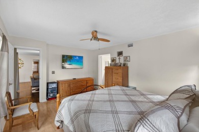 Rarely available 1st floor corner unit with serene lake views on Aberdeen Golf and Country Club in Florida - for sale on GolfHomes.com, golf home, golf lot