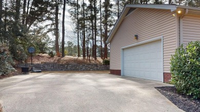 A charming two-story home nestled in the desirable Quail Ridge on Quail Ridge Golf Course in North Carolina - for sale on GolfHomes.com, golf home, golf lot