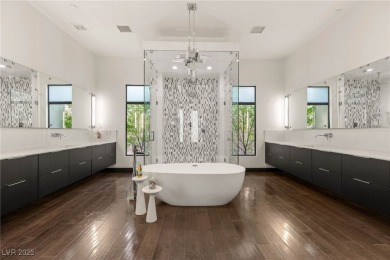 Tucked behind the gates of MacDonald Highlands, this exquisite on Dragon Ridge Country Club in Nevada - for sale on GolfHomes.com, golf home, golf lot